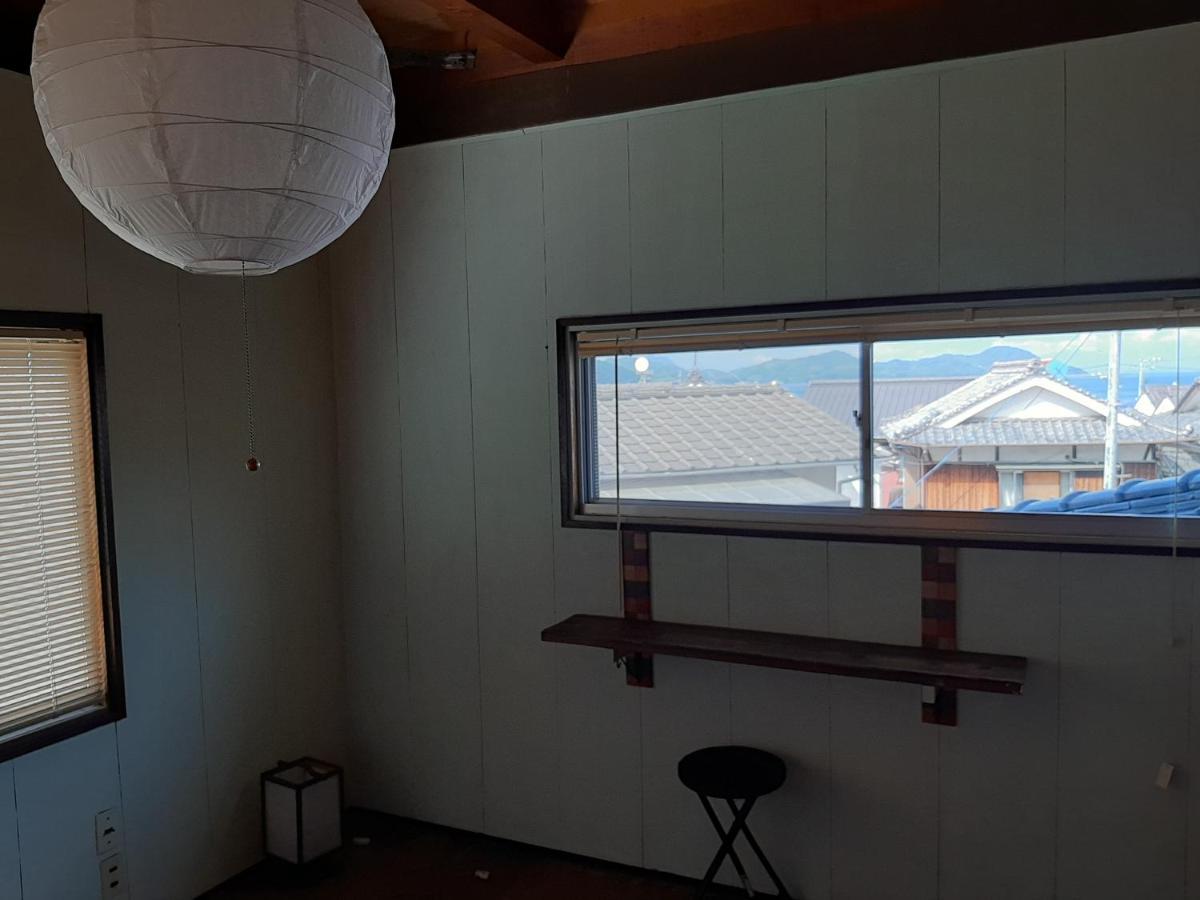 Guesthouse Kume Imabari Railway Station Exteriör bild
