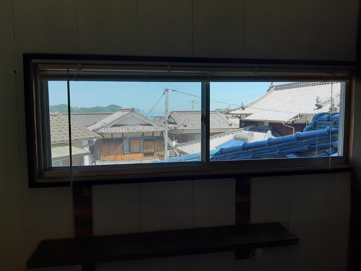 Guesthouse Kume Imabari Railway Station Exteriör bild